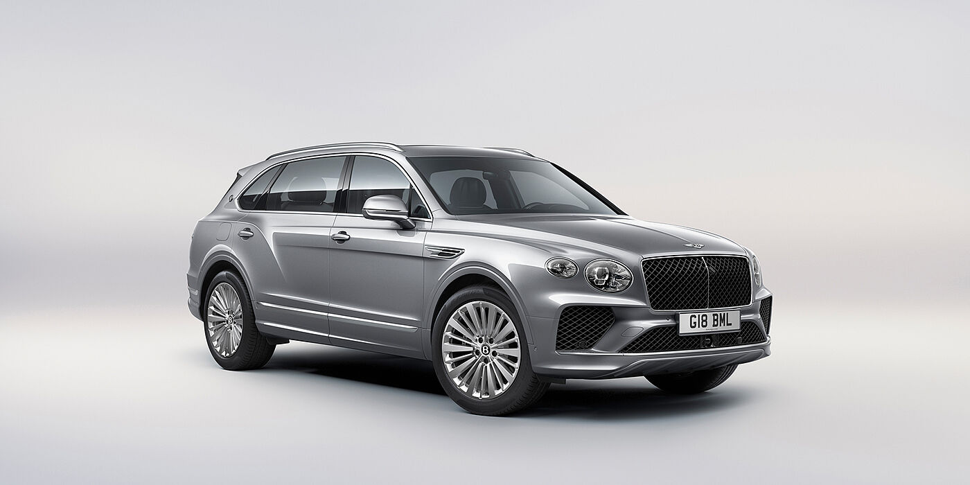 Bentley Hong Kong - Kam Lung Bentley Bentayga Extended Wheelbase luxury SUV front three quarter view in Moonbeam paint with 21 inch five spoke painted wheels