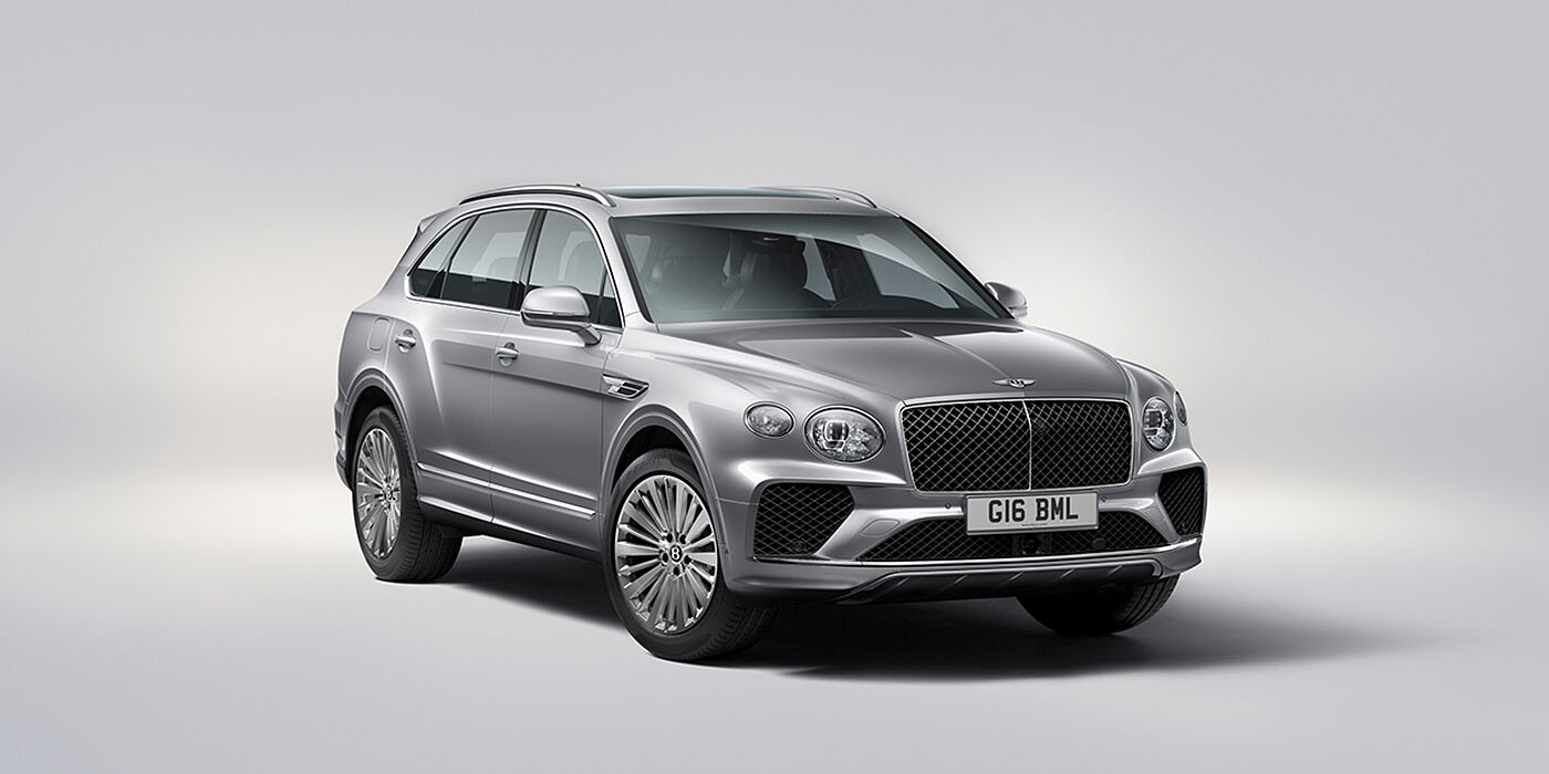 Bentley Hong Kong - Kam Lung Bentley Bentayga luxury SUV front three quarter view in Moonbeam paint with matrix grille and 21″ 5 spoke painted wheels