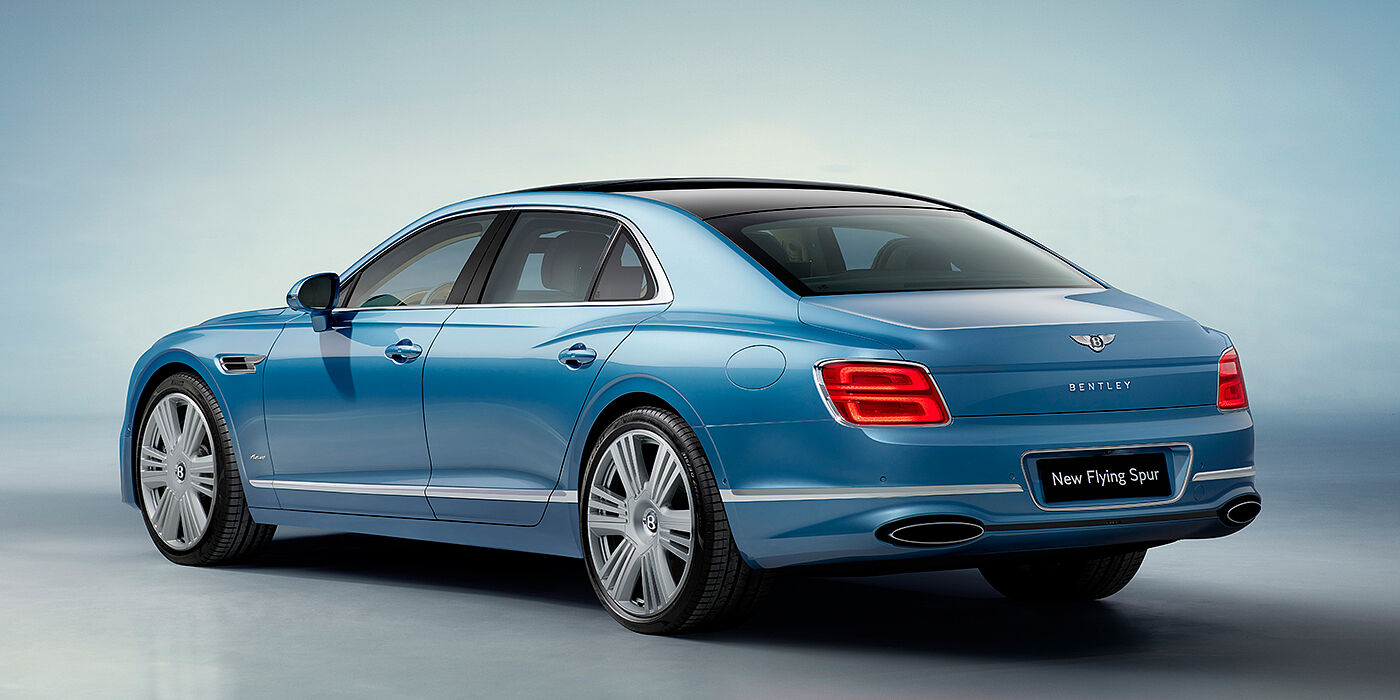 Bentley Hong Kong - Kam Lung New Bentley Flying Spur Azure sedan rear view in Light windsor blue by Mulliner paint with 22 inch Azure wheels and chrome exterior details