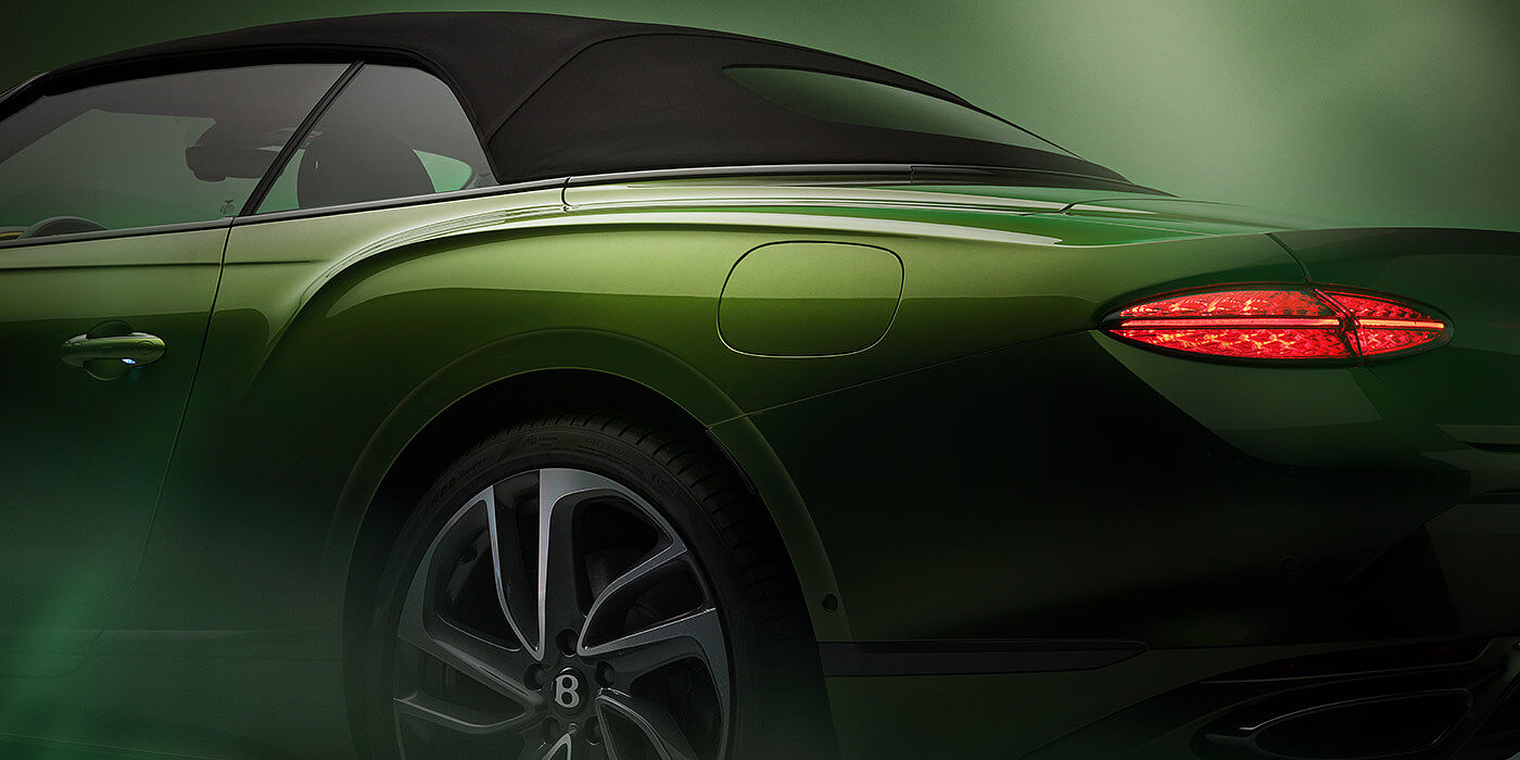 Bentley Hong Kong - Kam Lung Bentley New Continental GTC Speed rear haunch and tail lamp in Tourmaline Green paint and dark tint brightware with black hood up and illuminated head lamps