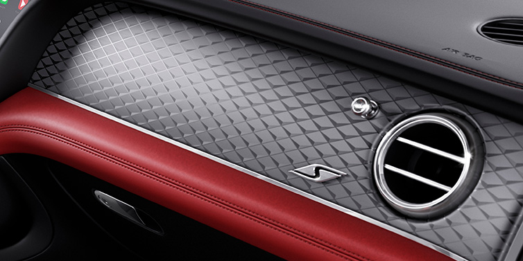 Bentley Hong Kong - Kam Lung Bentley Bentayga S SUV front interior dash with Dark Tint Diamond Brushed Aluminium veneer and S badge surrounded by Hotspur red and Beluga black hide