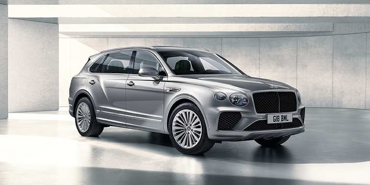 Bentley Hong Kong - Kam Lung Bentley Bentayga Extended Wheelbase SUV front three quarter in Moonbeam paint with a grey background