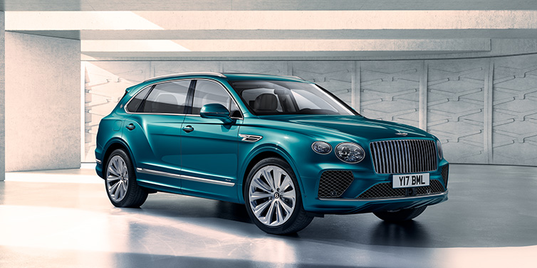 Bentley Hong Kong - Kam Lung Bentley Bentayga Extended Wheelbase Azure SUV front three quarter in Topaz blue paint colour with a grey background
