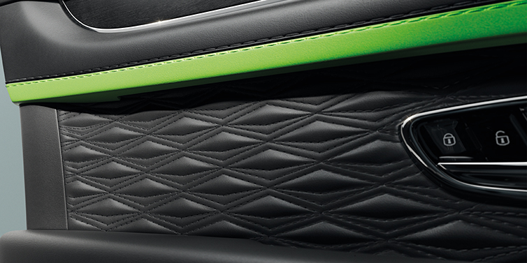 Bentley Hong Kong - Kam Lung Bentley Bentayga Speed SUV interior door detail with Diamond in Diamond stitched hide in Beluga black colour, with Black stained Crown Cut Walnut veneer