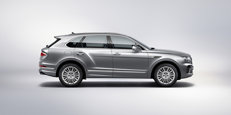 Bentley Hong Kong - Kam Lung Bentley Bentayga SUV side profile in Moonbeam silver paint against white background featuring 21 inch 5 spoke wheels