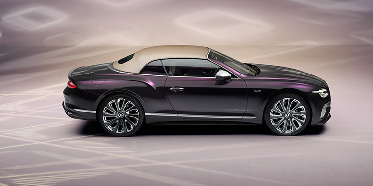 Bentley Hong Kong - Kam Lung Bentley Continental GTC Mulliner convertible in profile with hood up, in Tanzanite Purple paint and 22 inch Mulliner painted and polished wheels