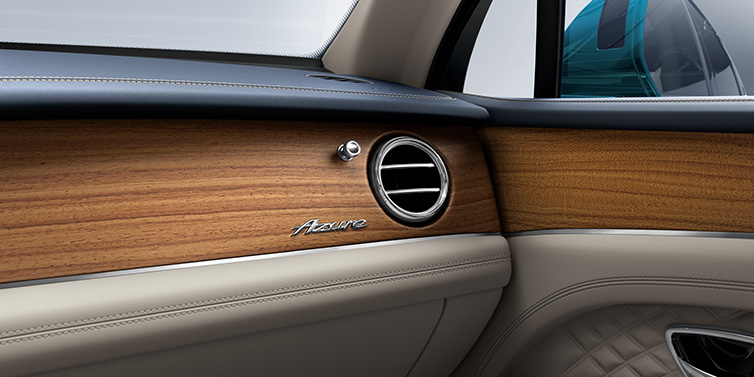 Bentley Hong Kong - Kam Lung Bentley Bentayga Extended Wheelbase Azure front dash showing Open Pore Koa veneer surrounded by Portland and Imperial Blue hides
