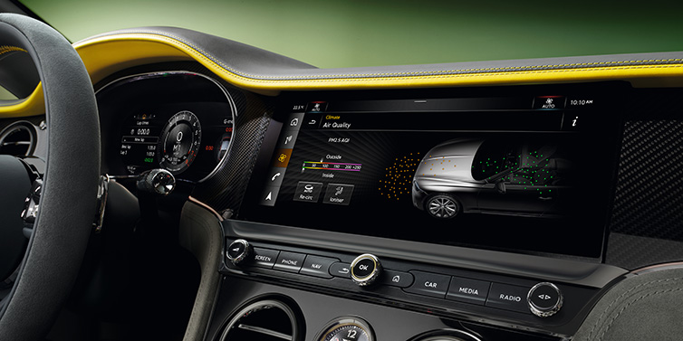 Bentley Hong Kong - Kam Lung Bentley Continental GTC Speed convertible front interior centre console with MMI screen showing Air Quality visualisation surrounded by Cyber Yellow by Mulliner and Gravity Grey hides and high gloss carbon fibre veneer