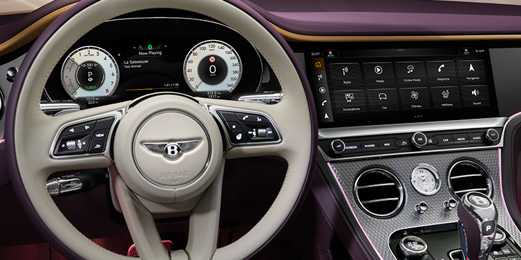 Bentley Hong Kong - Kam Lung Bentley Continental GTC Mulliner convertible steering wheel and drivers screens surrounded by Damson purple and Linen hides